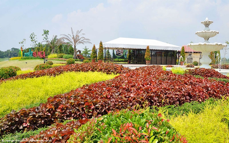 Camella Balanga sales office with garden and fountain