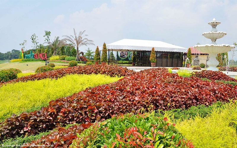 Camella Balanga sales office with garden and fountain