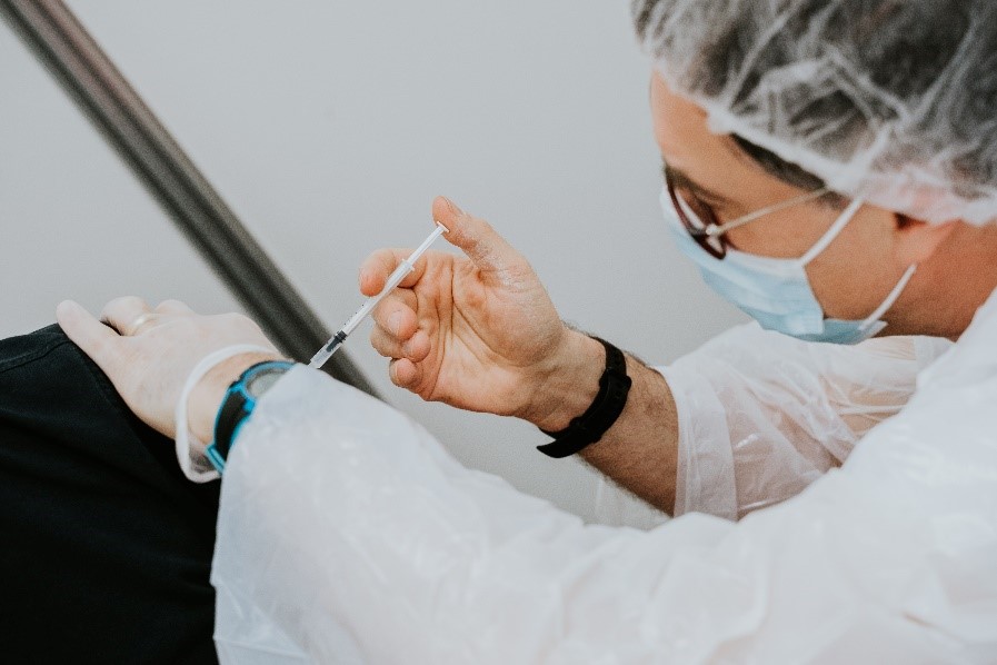 Get vaccinated before traveling | Photo by Mat Napo on Unsplash
