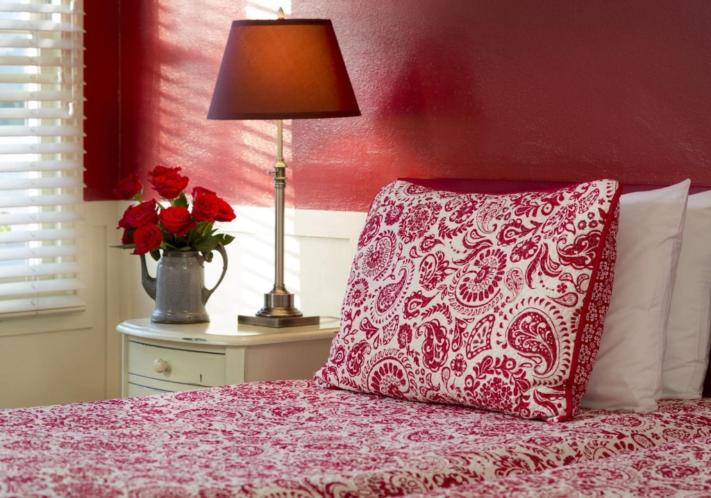 A predominantly red bedroom