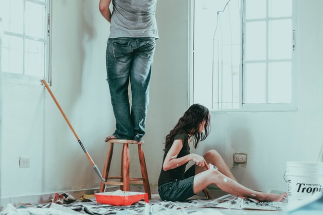 Apply a coat of primer | House painting budget