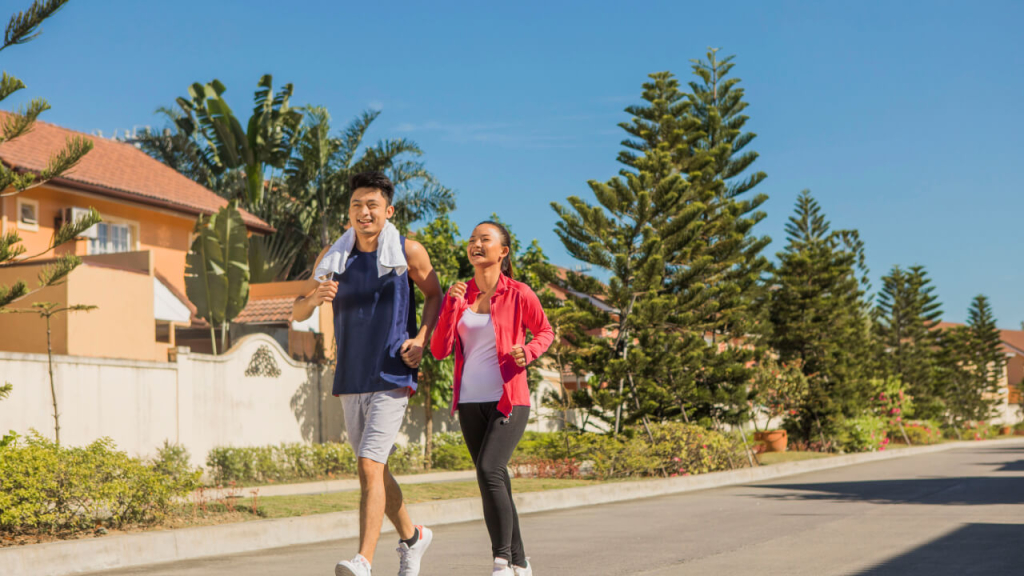 couple jogging inside camella community subdivision in malvar batangas