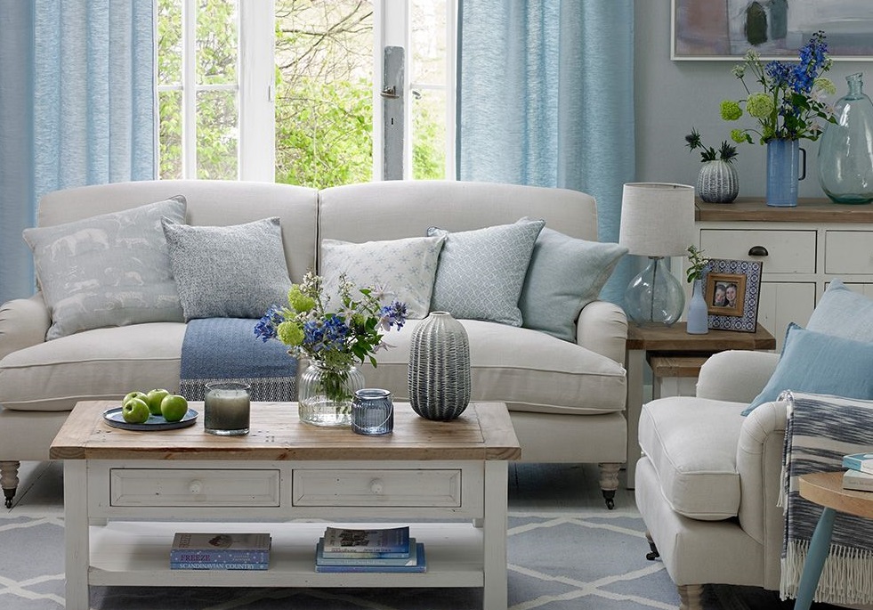 A living room with coastal interior design by Ideal Home