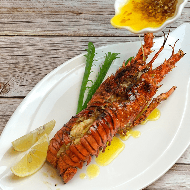 Ocho Seafood and Grill’s lobster butter garlic/Ocho Seafood and Grill Facebook