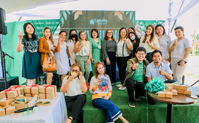 Camella Mega South Division Head, Ms. Ma. Teresa Tumbaga with Camella Malvar's marketing team and selling partners
