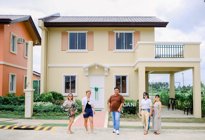 Camella's Marketing team with the new house models