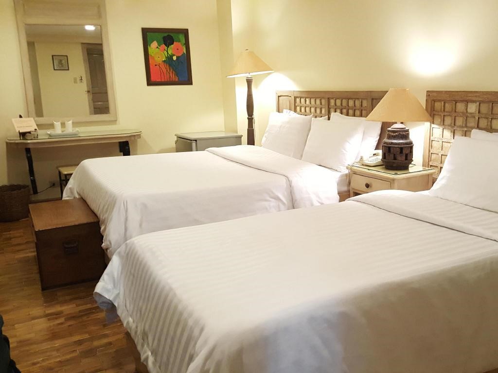 Inside your room at Roxas President’s Inn Agoda Photo