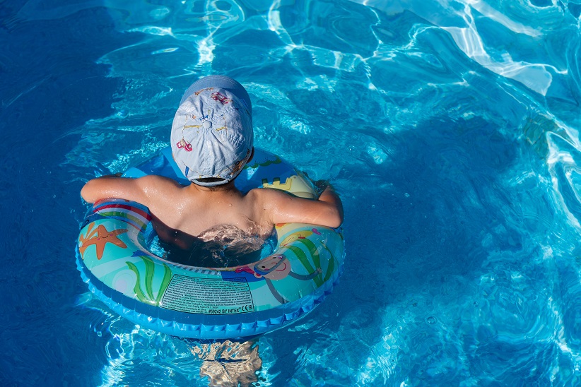 Kid enjoying in the Pool | Photo from Unsplash