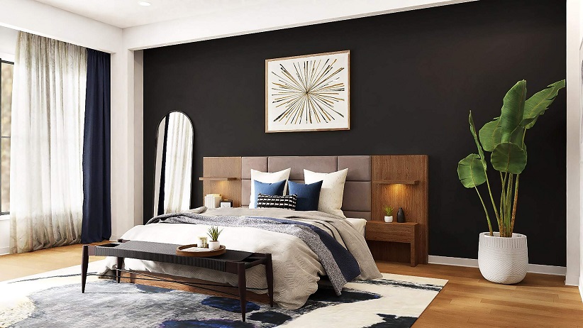 Dark accent wall and rich colored items inside the room
