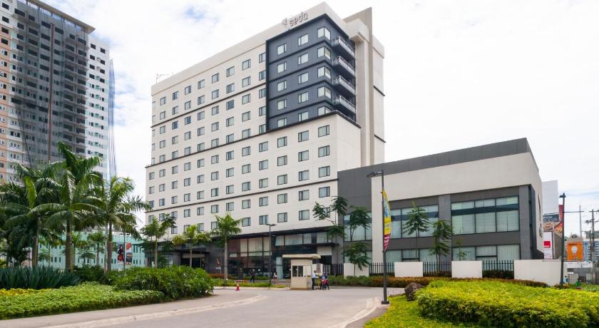 Seda Hotel in Davao building frontage Photo from Agoda