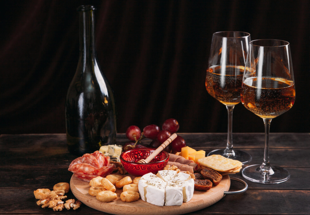 Charcuterie Board wiyh Two Glasses of Wine