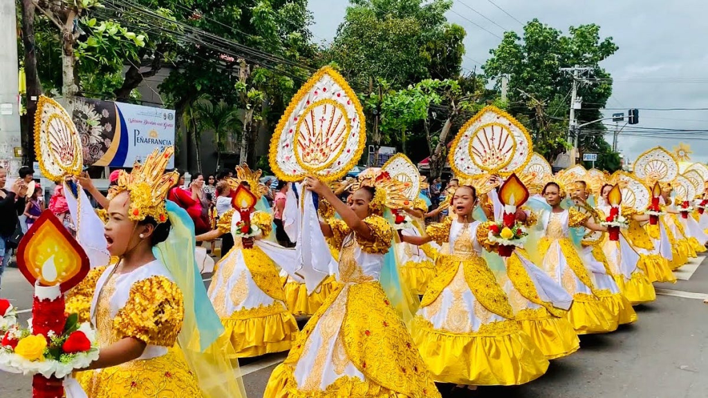 Celebrating Penafrancia Festival 2024 | Image source: https://bicol.politiko.com.ph/2018/09/12/long-processions-start-today-in-naga-as-our-lady-of-penafrancias-fluvial-parade-nears/headlines/