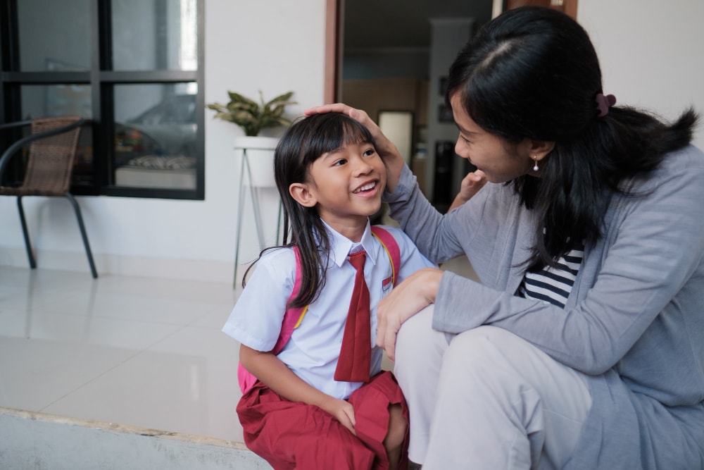 Whispering positive messages to your kids before and after going to school reinforces teachers resources