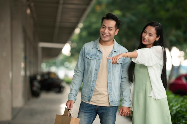 Source: https://img.freepik.com/free-photo/couple-outdoors-shopping-spree-together_23-2149443022.jpg?t=st=1746524693~exp=1746528293~hmac=11080fd37575ea77e033b40efb26ddbf144d9288a0a22fcbd806a5216a4a1ed3&w=1380